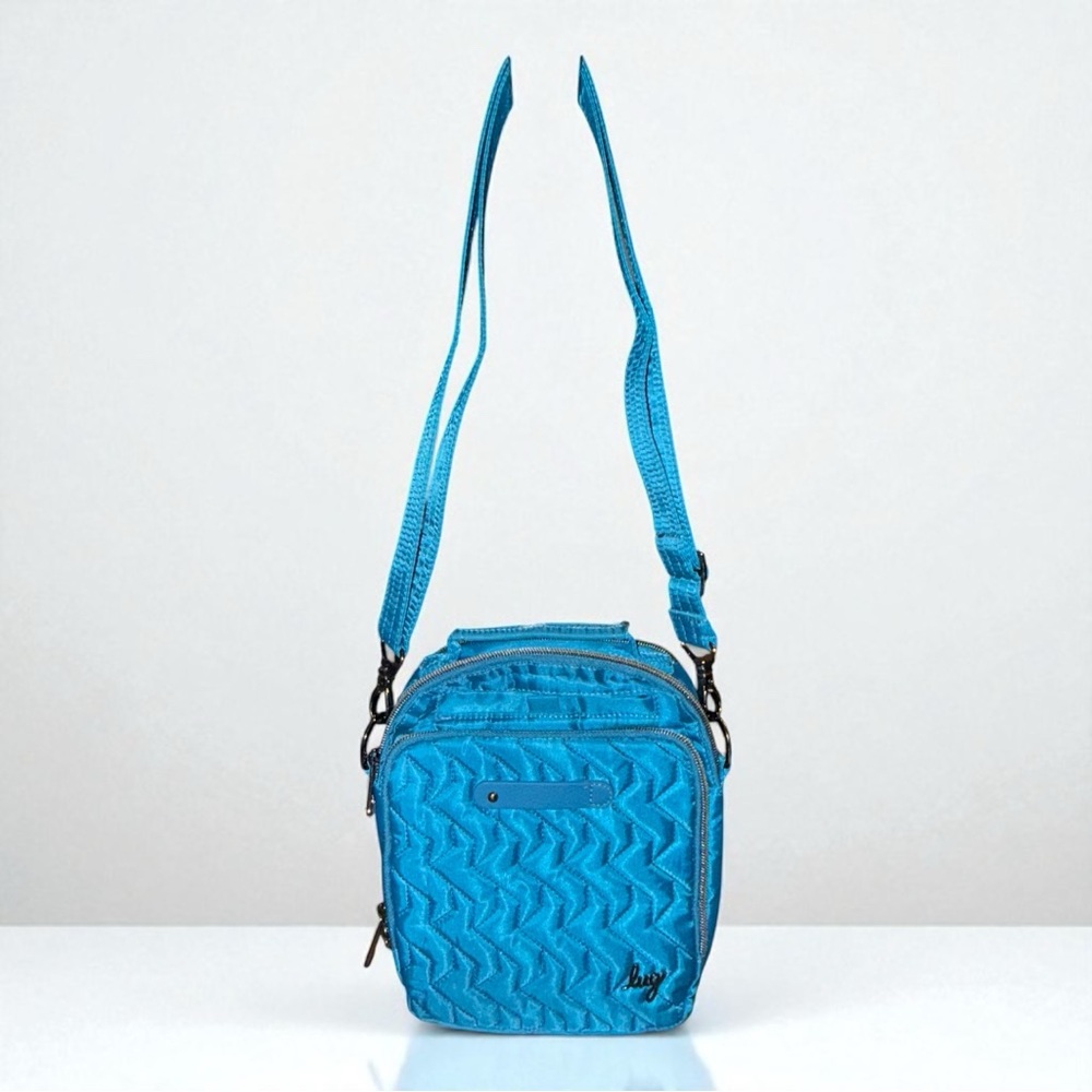 Lug RFID Ocean Blue Skeeter crossbody with charm bar and adjustable strap